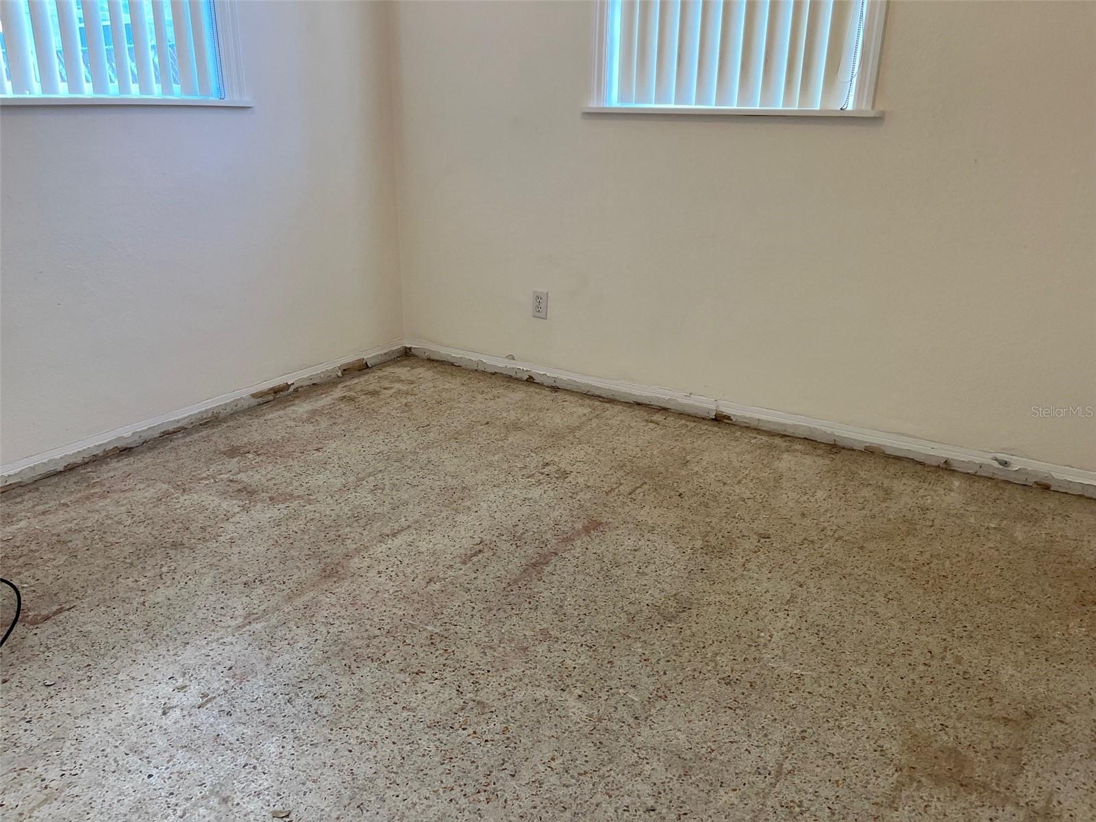 AFTER HELENE - wood flooring removed in bedroom