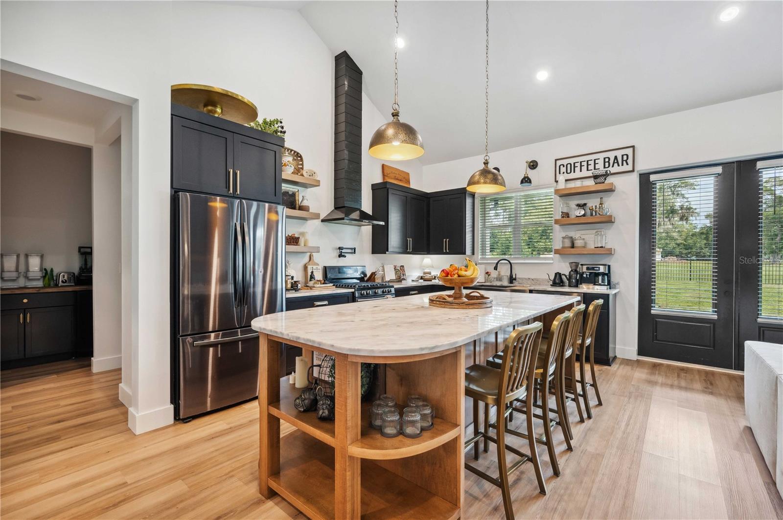 View of Kitchen from Dining Room with Walk in Panty