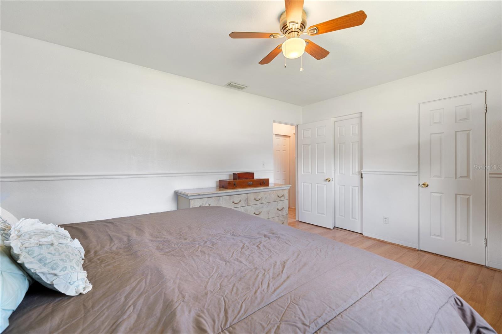 Main bedroom has walk-in closet and en suite bath