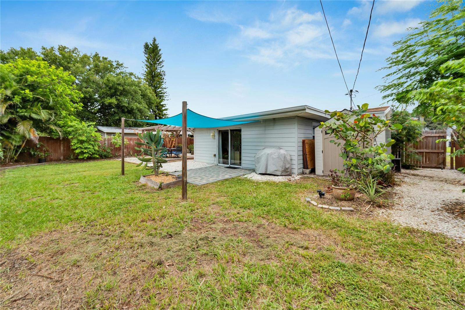 Oversized Fenced Back Yard for the Kids & Fur Babies to Play