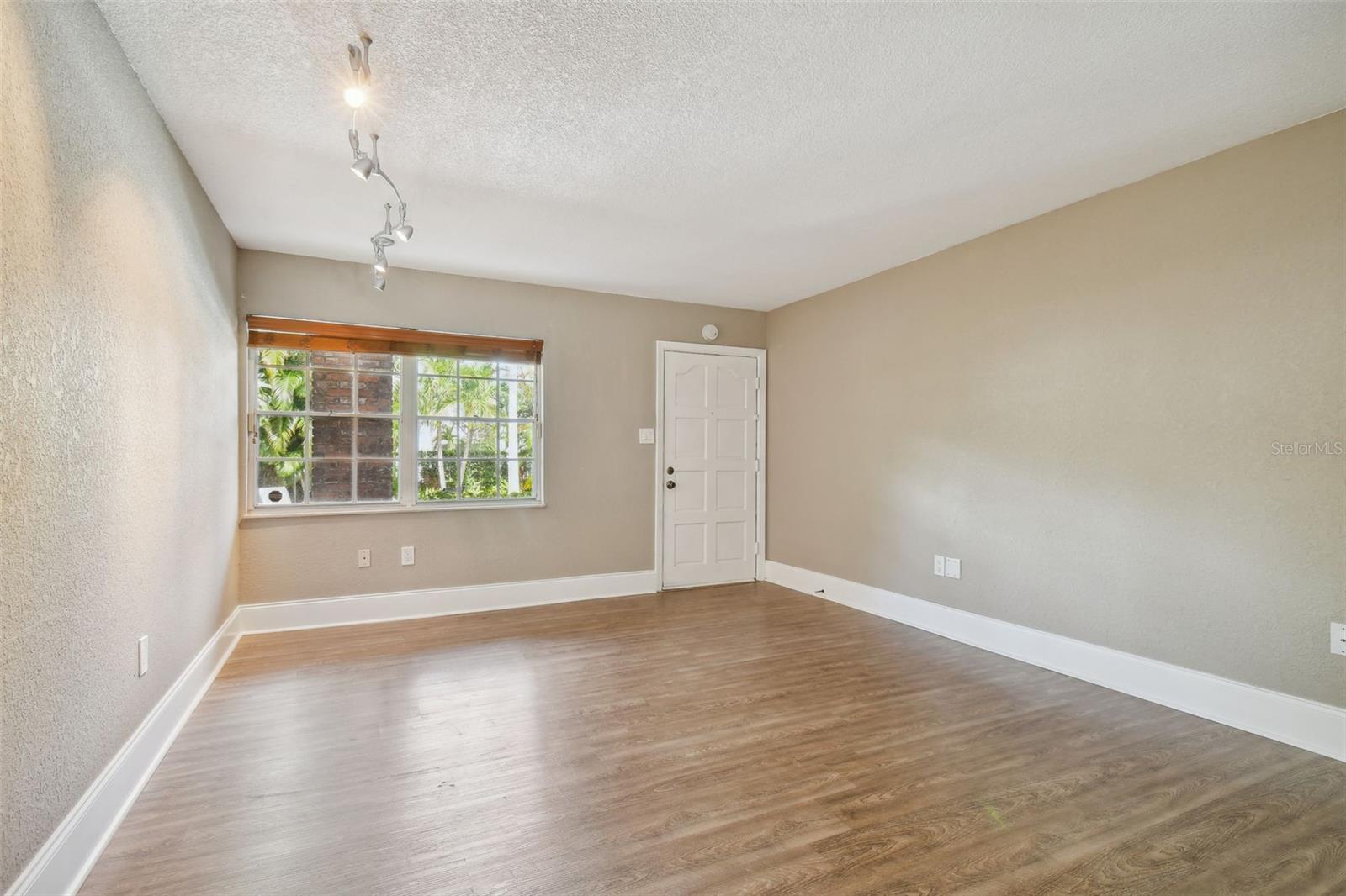 LIVING-DINING FACING FRONT DOOR