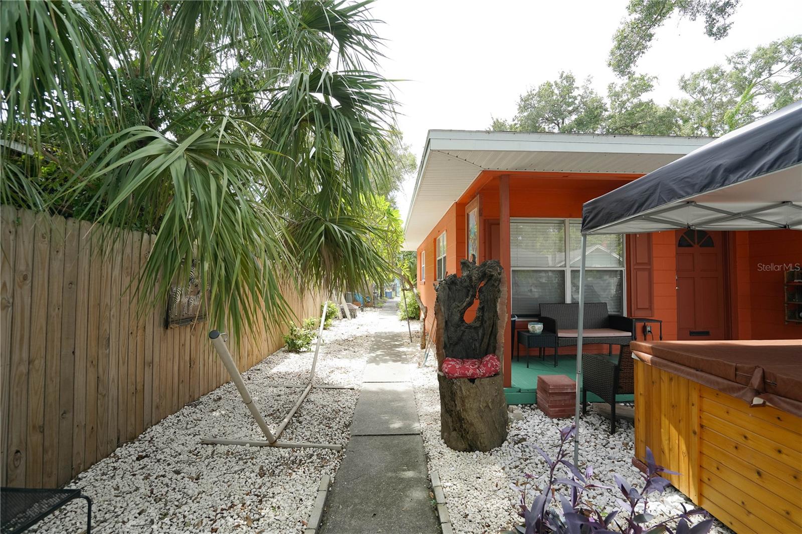 Side walk way to garage/adu. east side of house