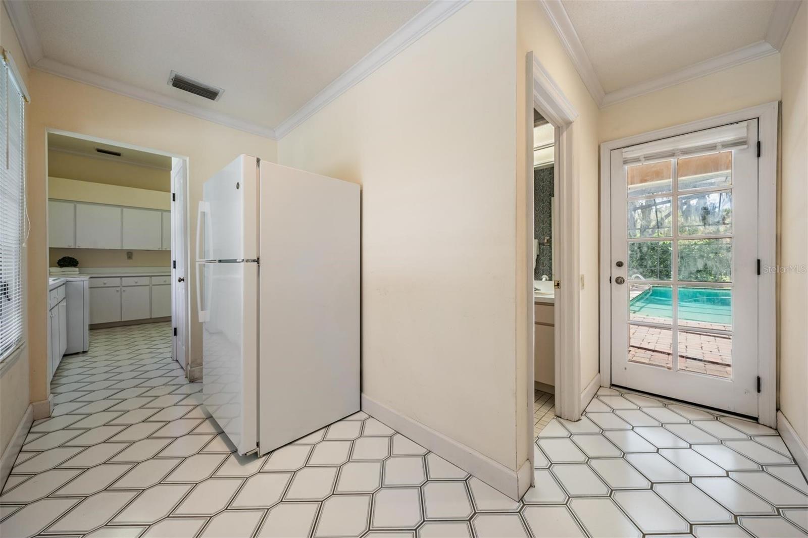 Utility Room and Access to Pool Bath