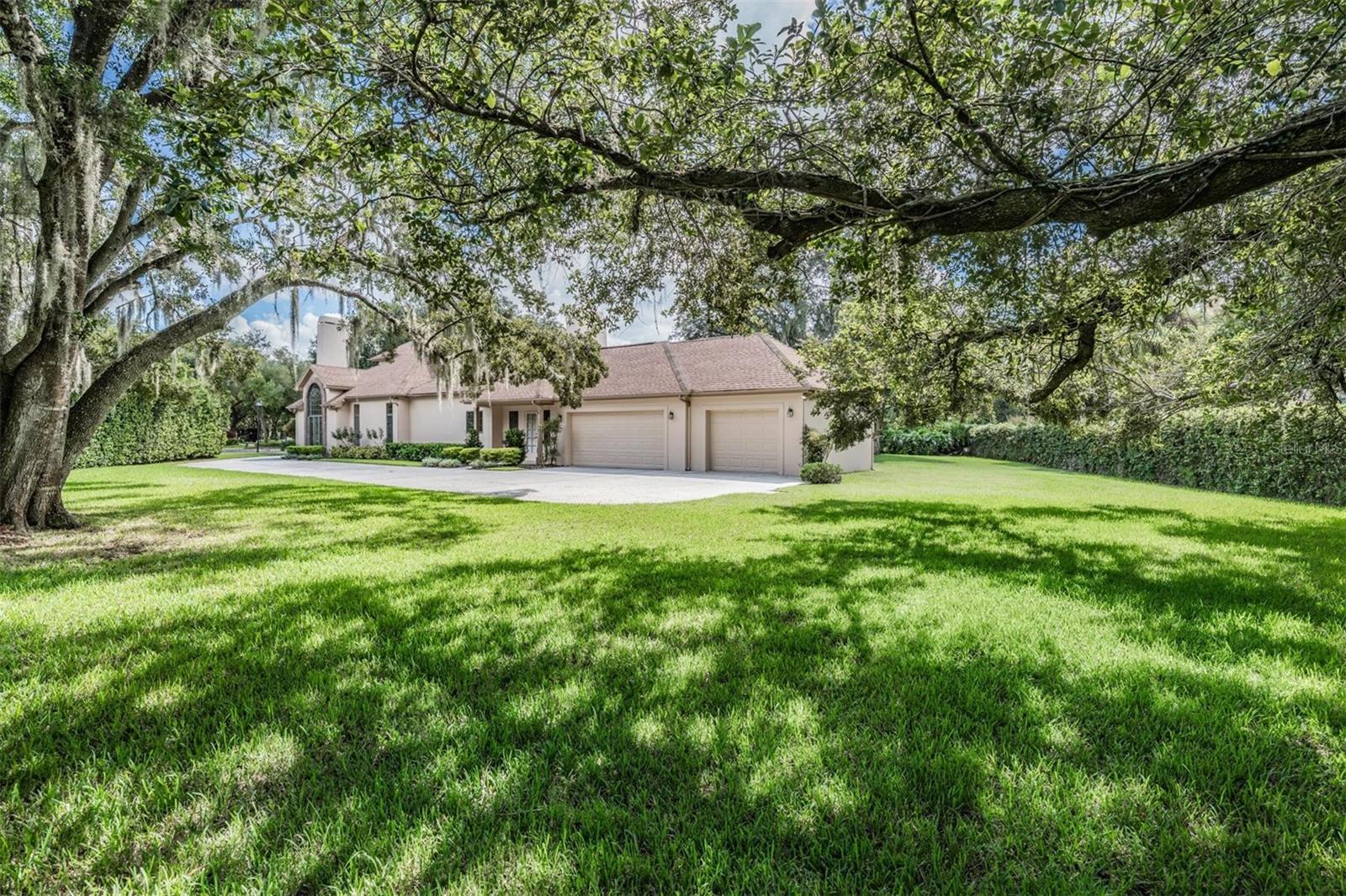 Gorgeous Half Acre Lot 3 Car Side Entry Garage