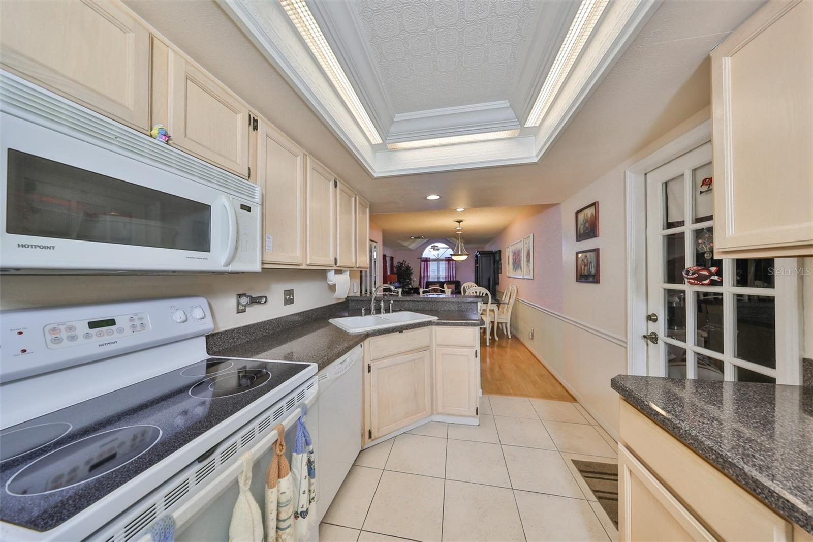 The kitchen overlooks the whole unit, so you never feel left out of the action.