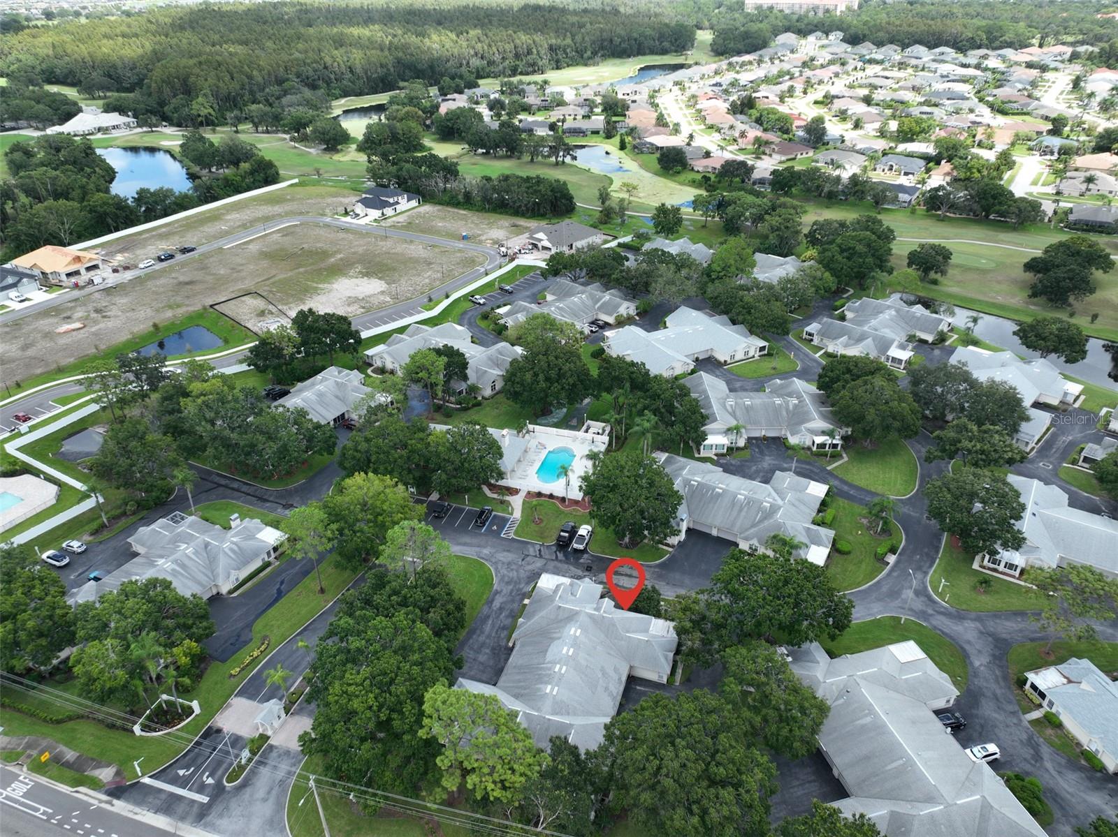 Aerial view of the condo and the clubhouse and pool (whish is right across the street)