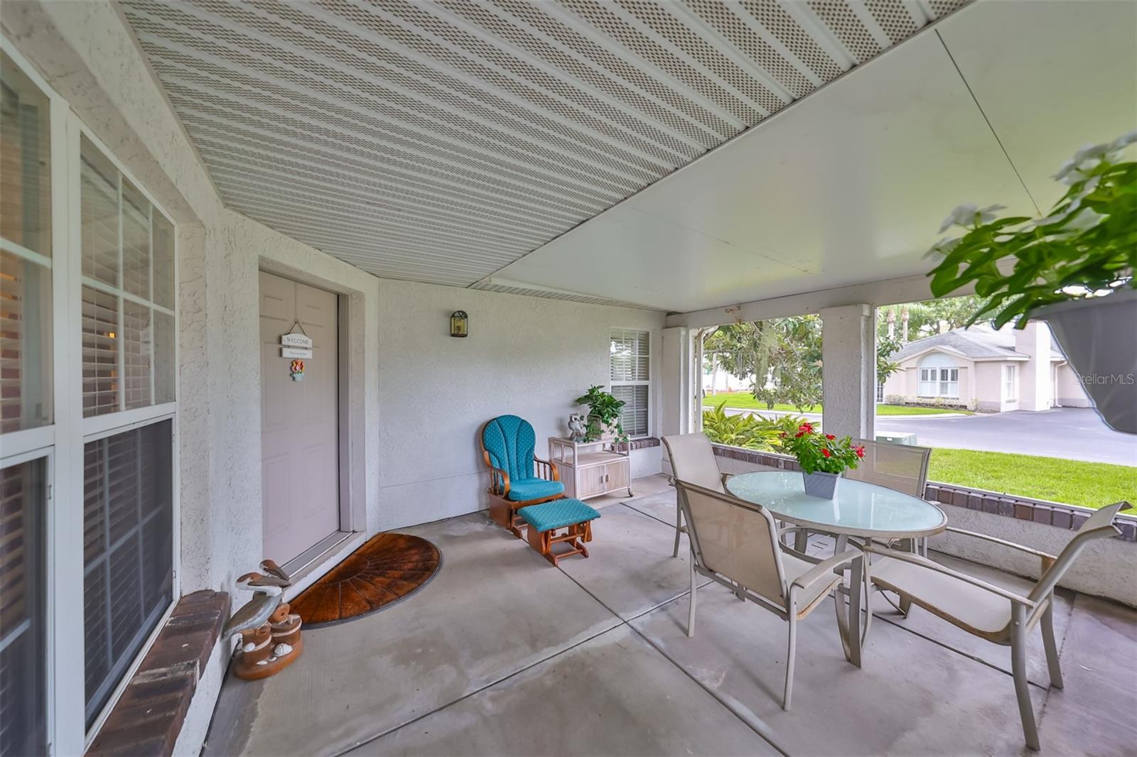 Large, screened patio for watching the world go by.