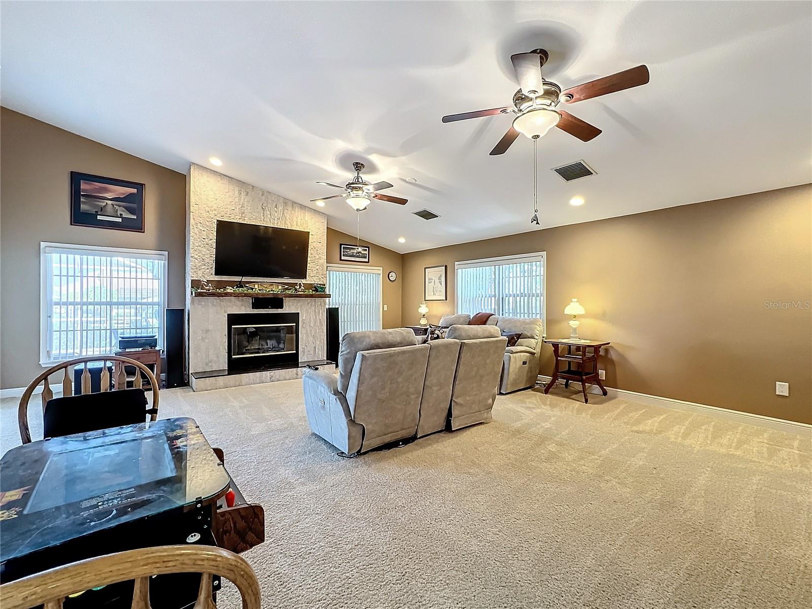 Vaulted ceiling, wood burning fireplace