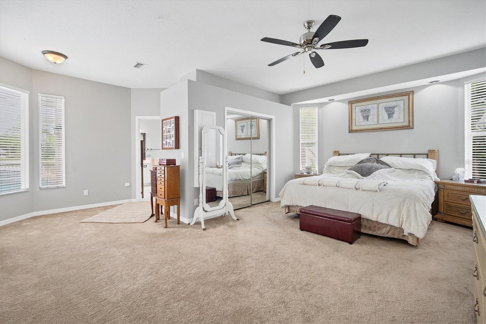 Master Bedroom offers enough space for a small sitting area on left.