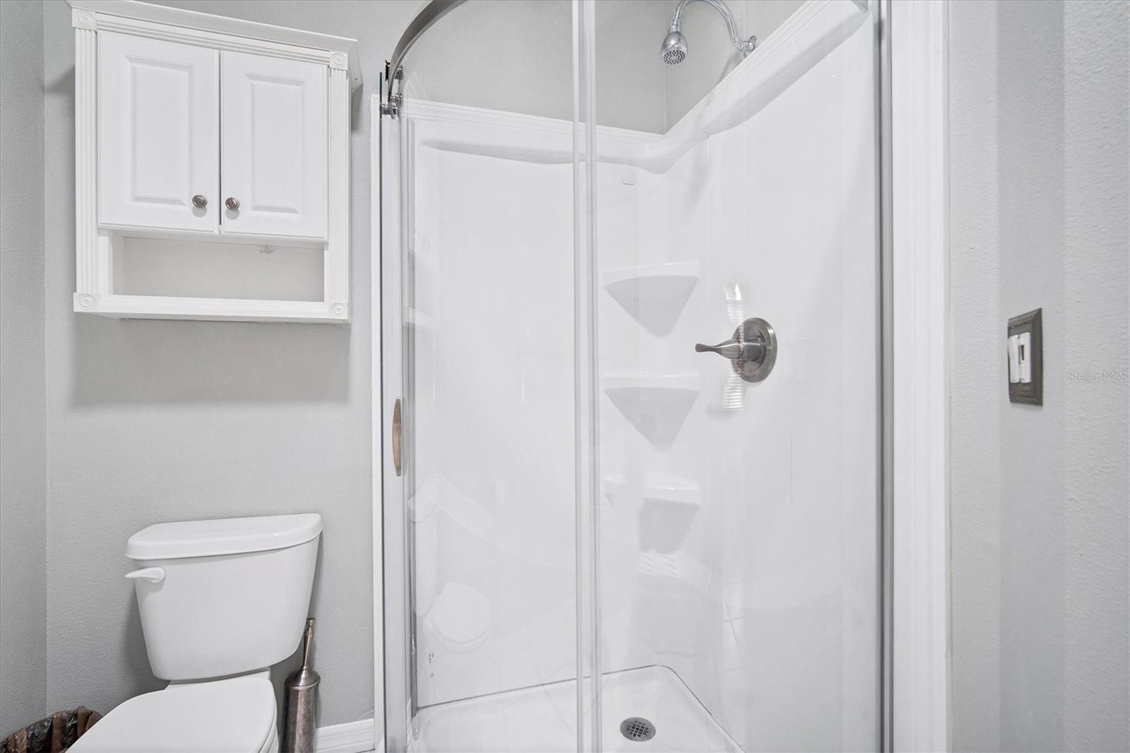 Walk in shower in hall bathroom