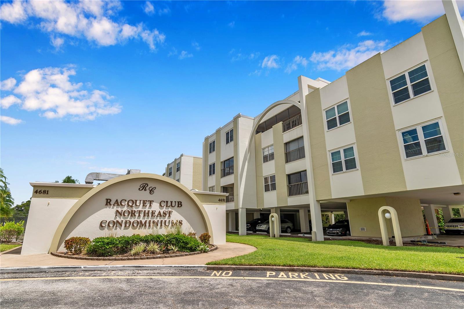 Signage and clubhouse in front of Building B.