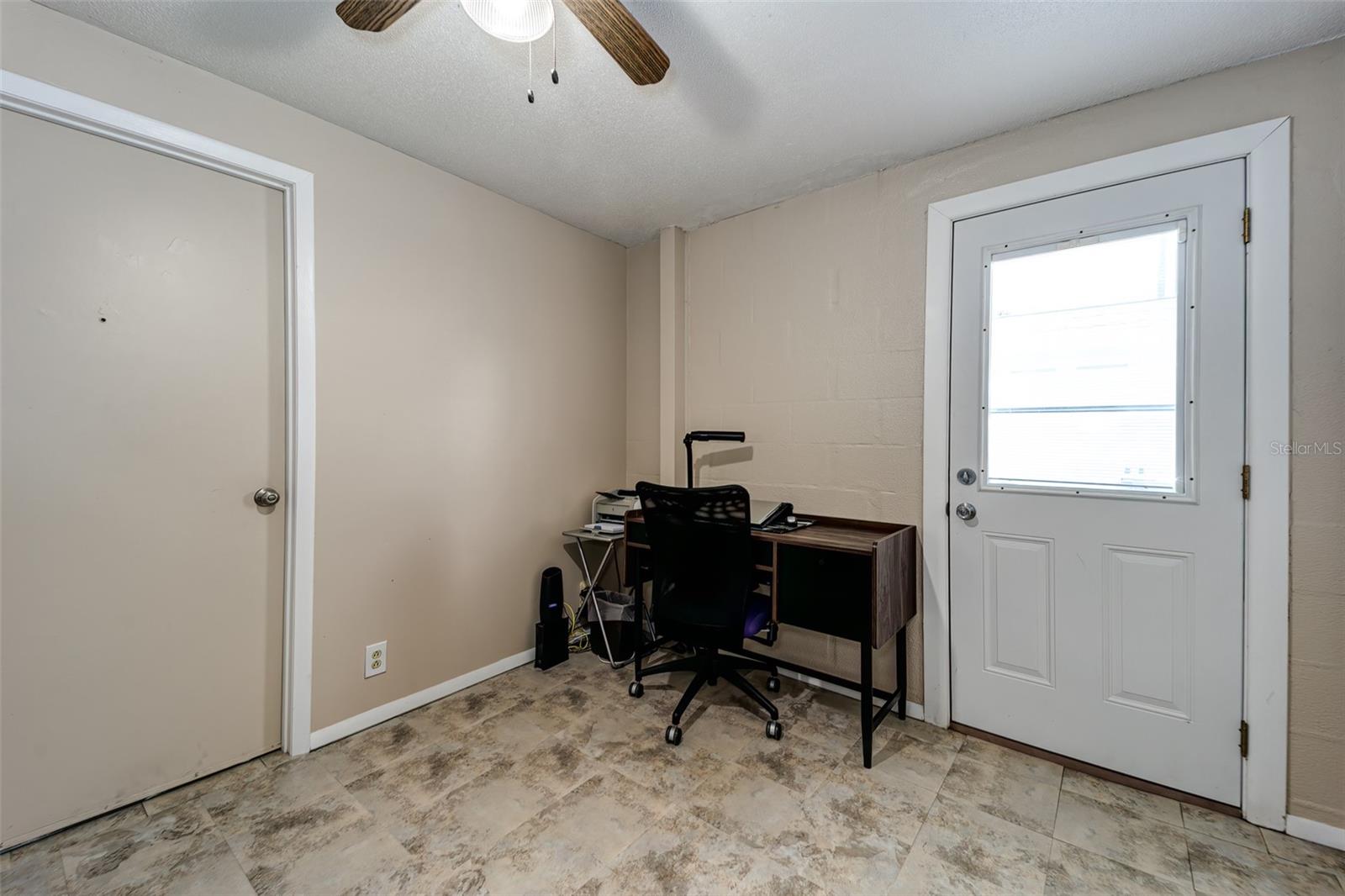 Third bedroom has side entry door