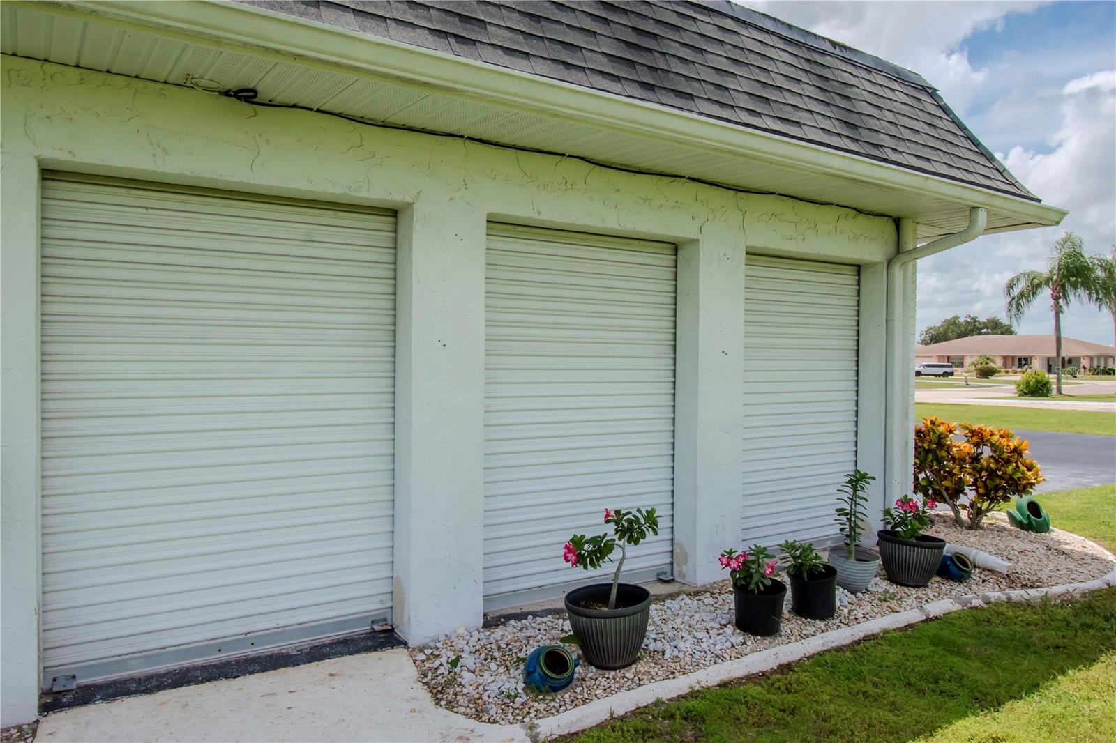 Side of garage with hurricane shutters