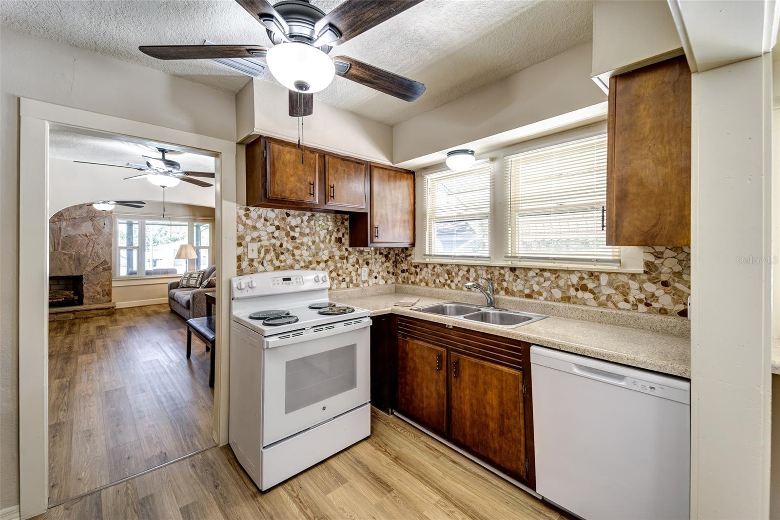 Kitchen view to dining and living rooms