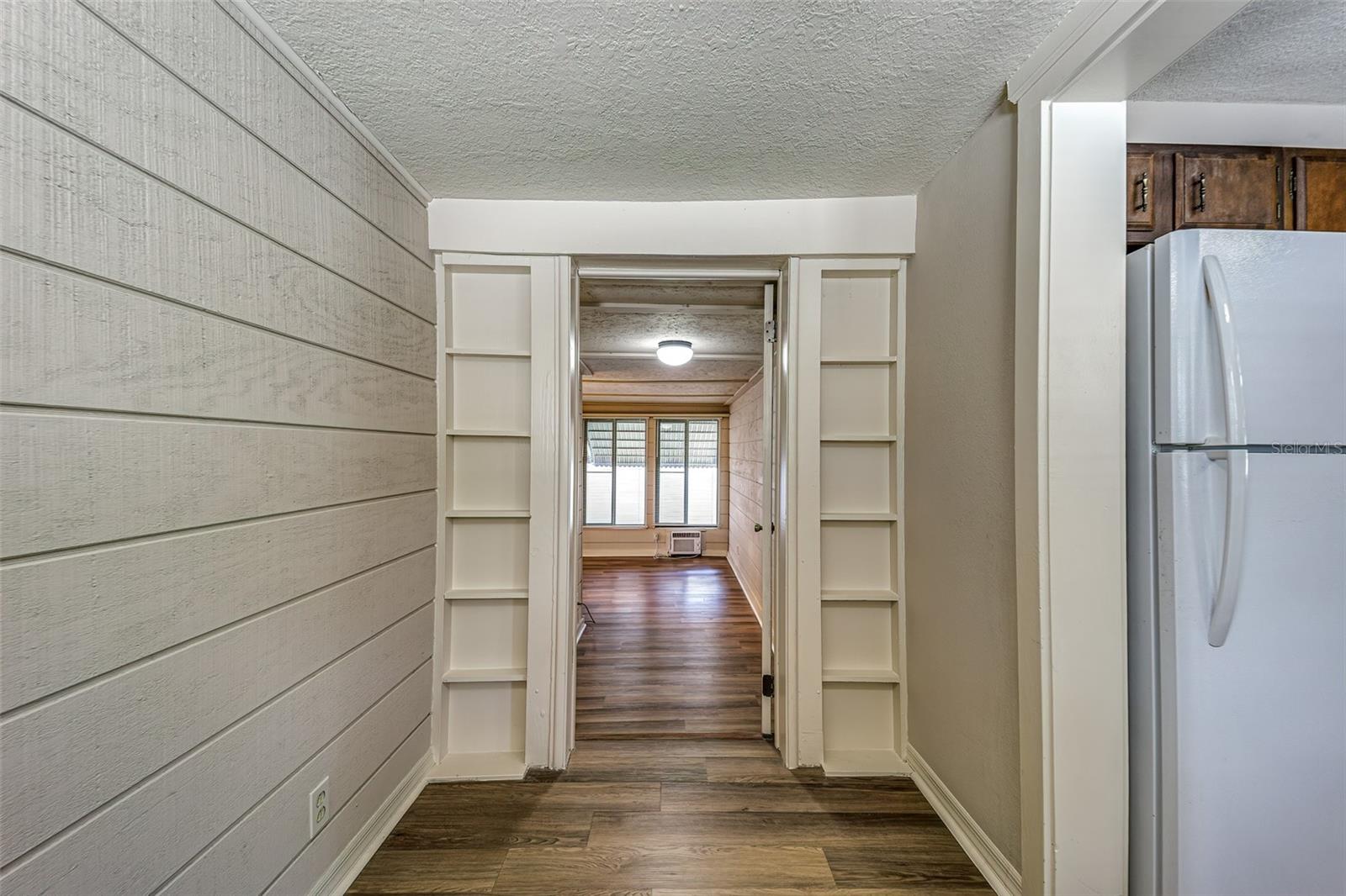 Entrance to third bedroom/office from kitchen....bedrooms are three-way split plan for privacy!