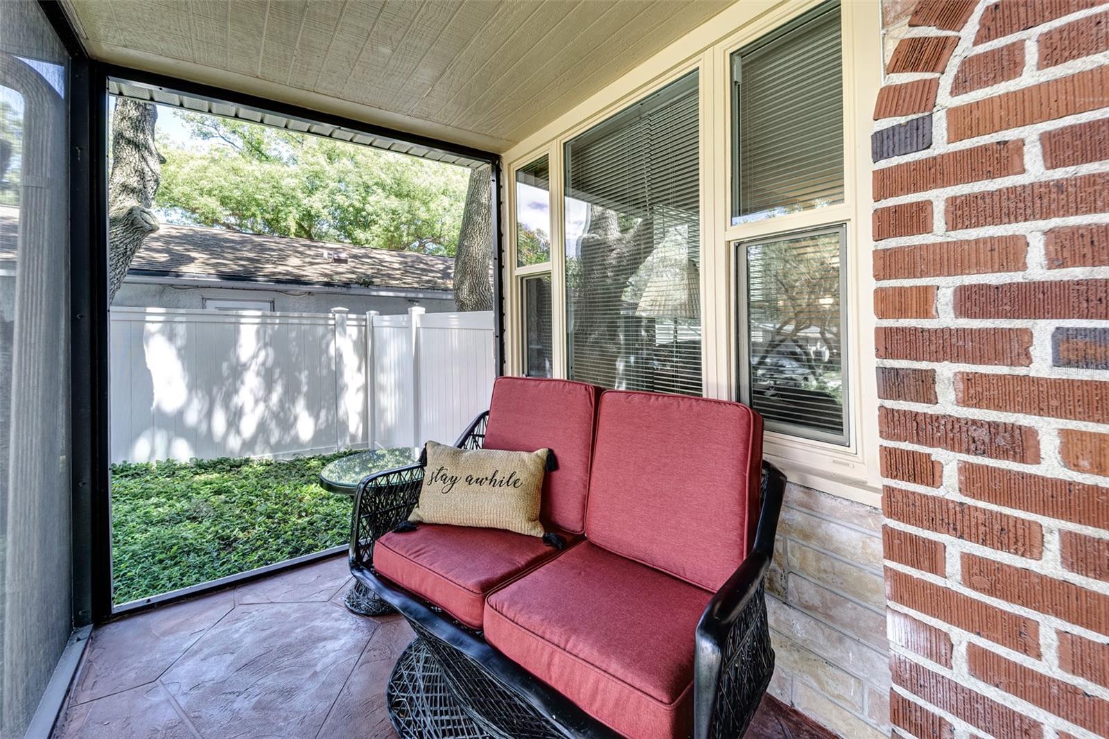 Screened and shaded front porch for relaxation!