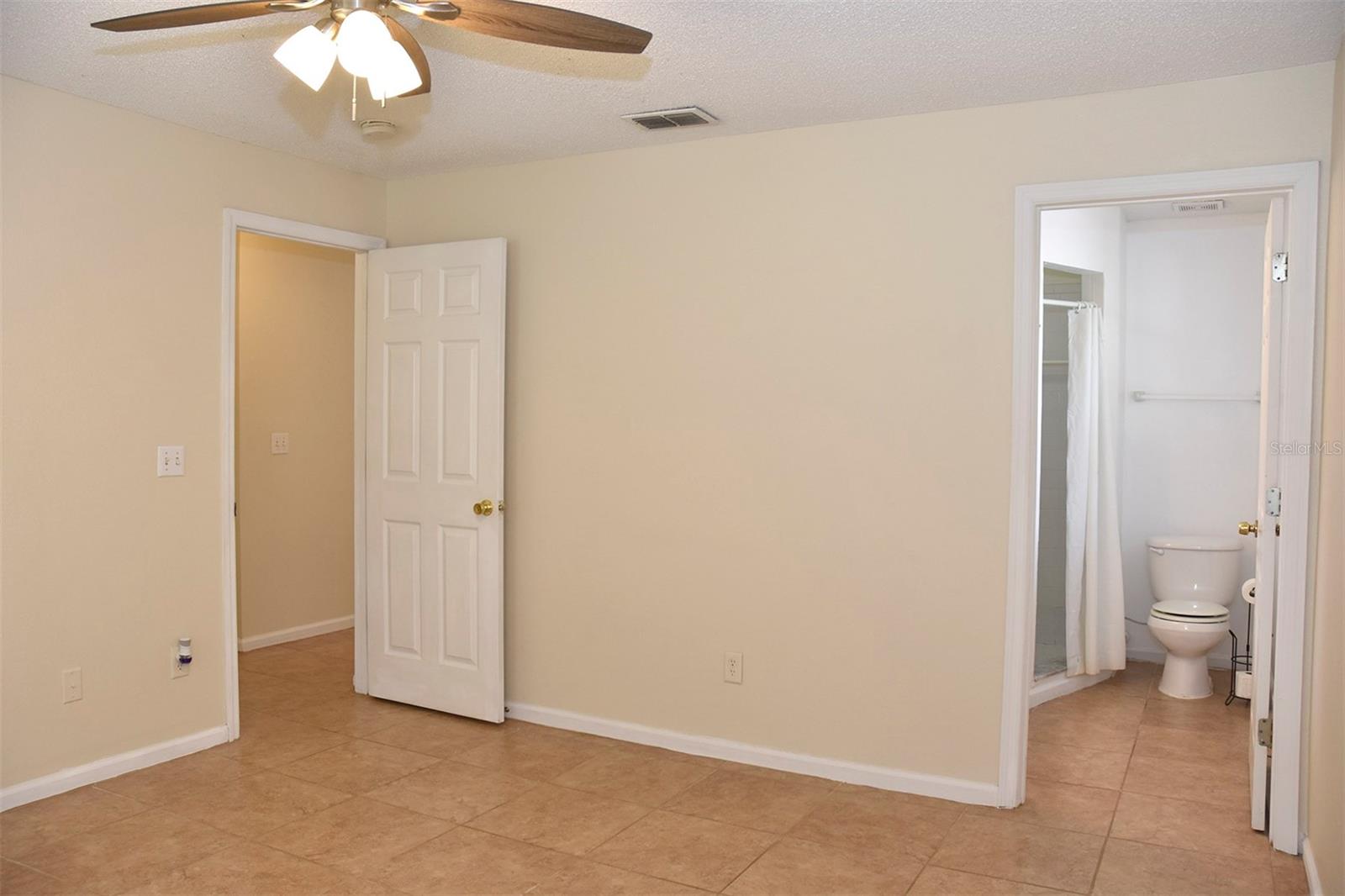 Primary bedroom with ensuite on the right.