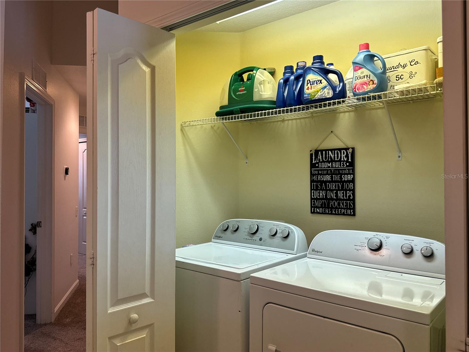 Upstairs double closet laundry room