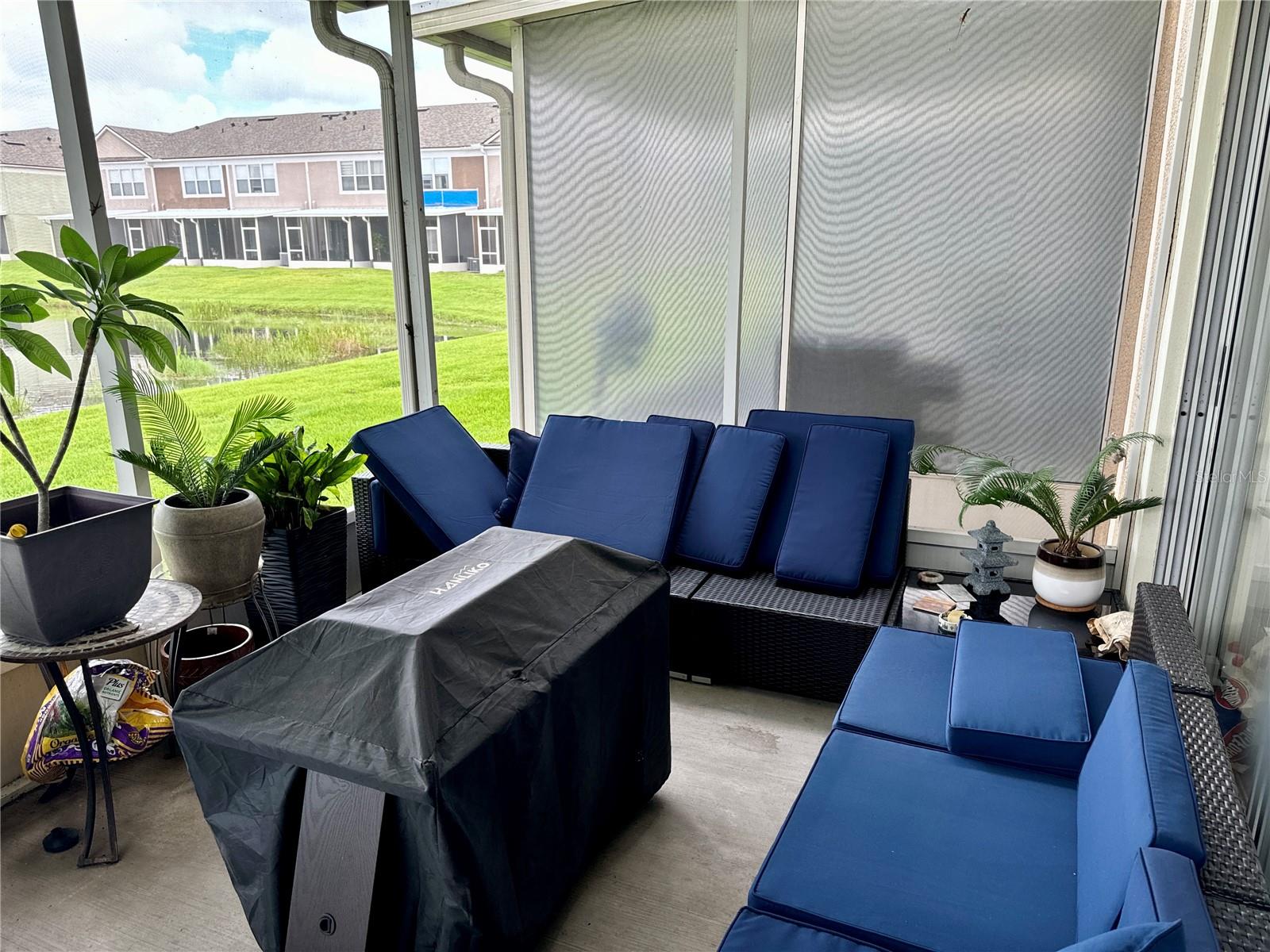 Screened lanai overlooking pond