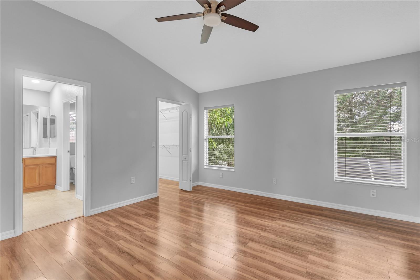 MASTER BEDROOM ON 2ND FLOOR WITH ENTRIES TO WALK-IN CLOSET AND MASTER BATH.