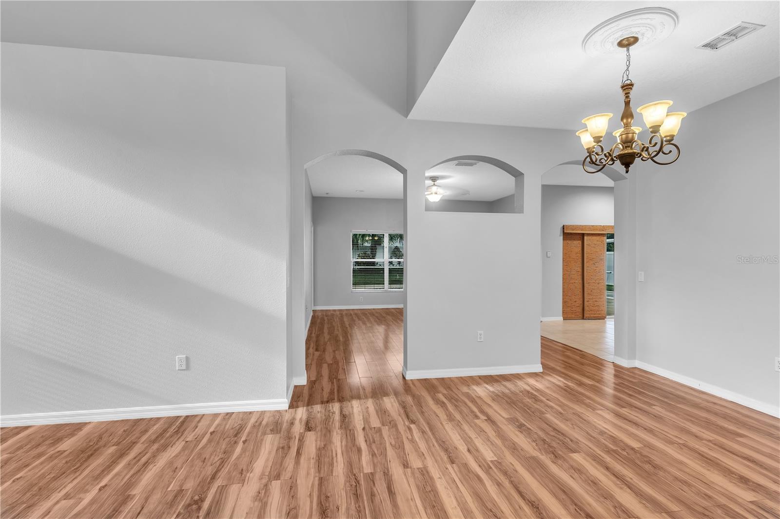 VIEW OF DINING ROOM AND ENTRY TO FAMILY ROOM