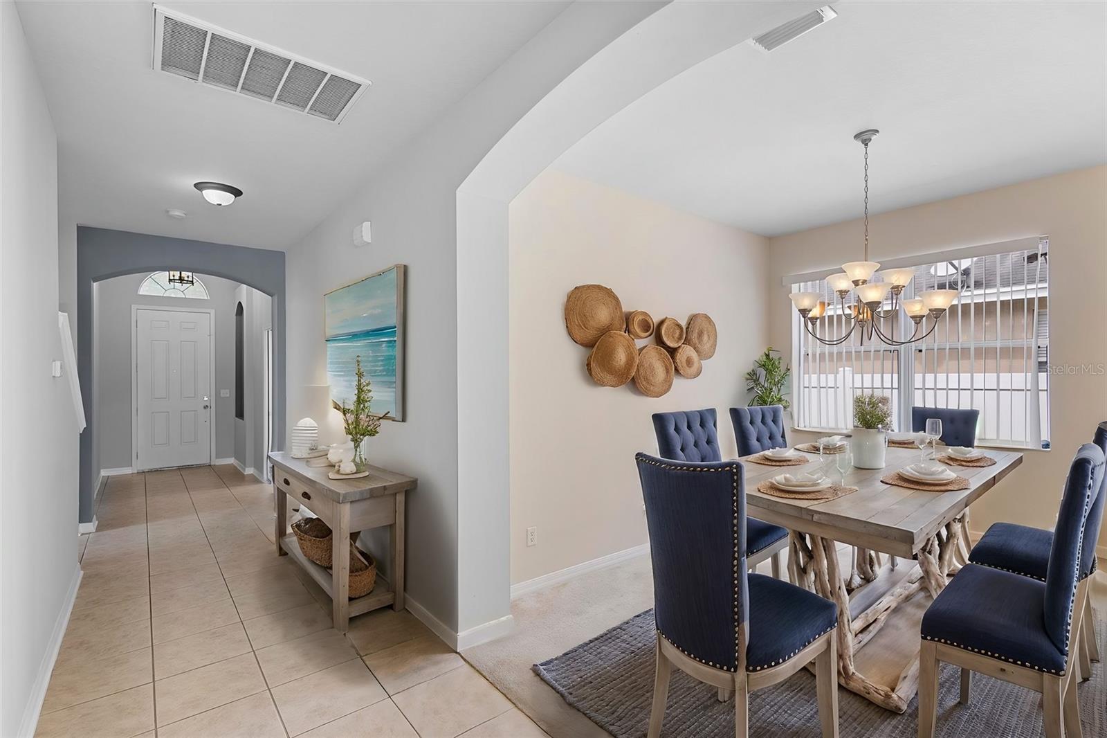 Formal Dining Area and Entranceway - Staged