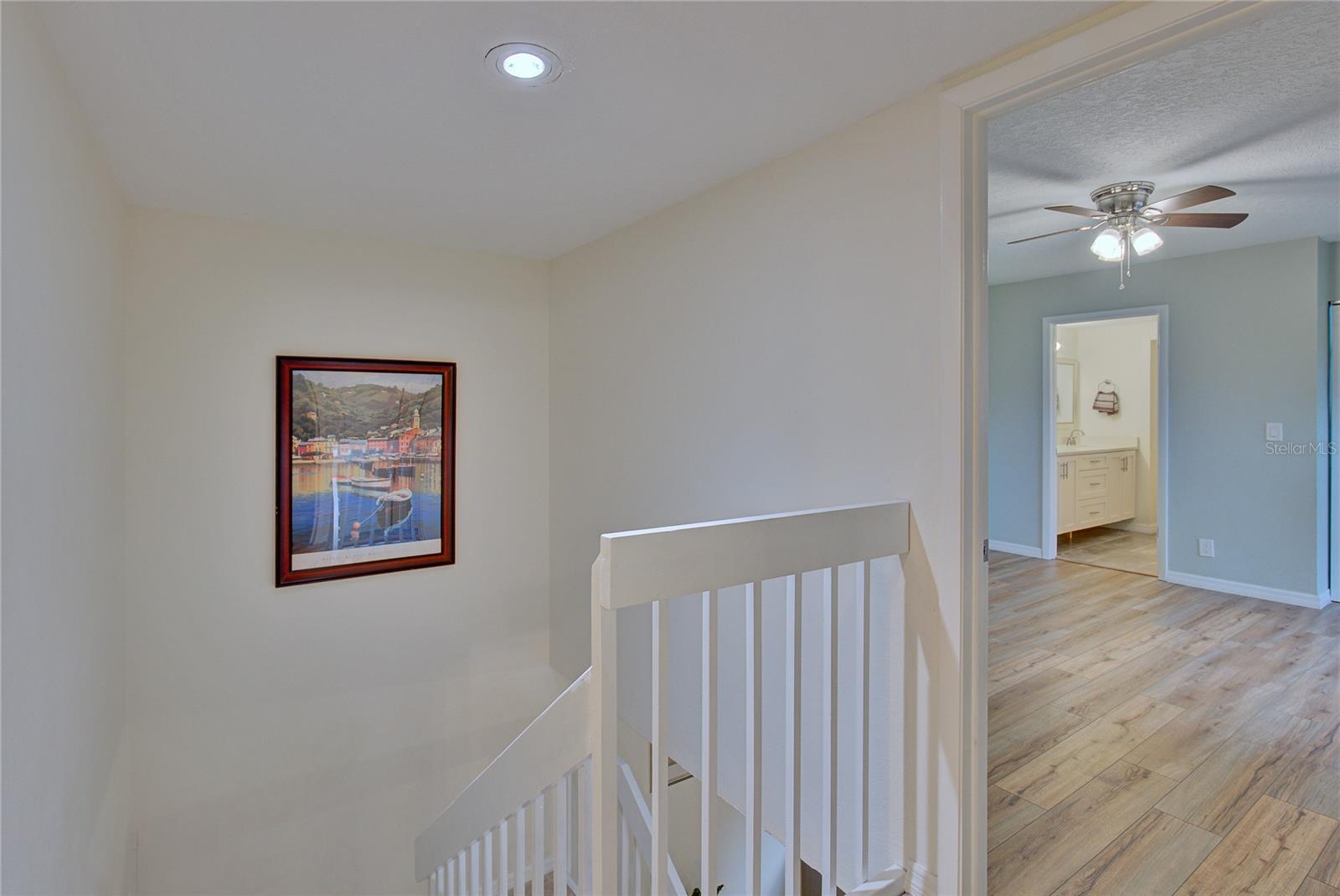 Stairway to the upper level and master bedroom