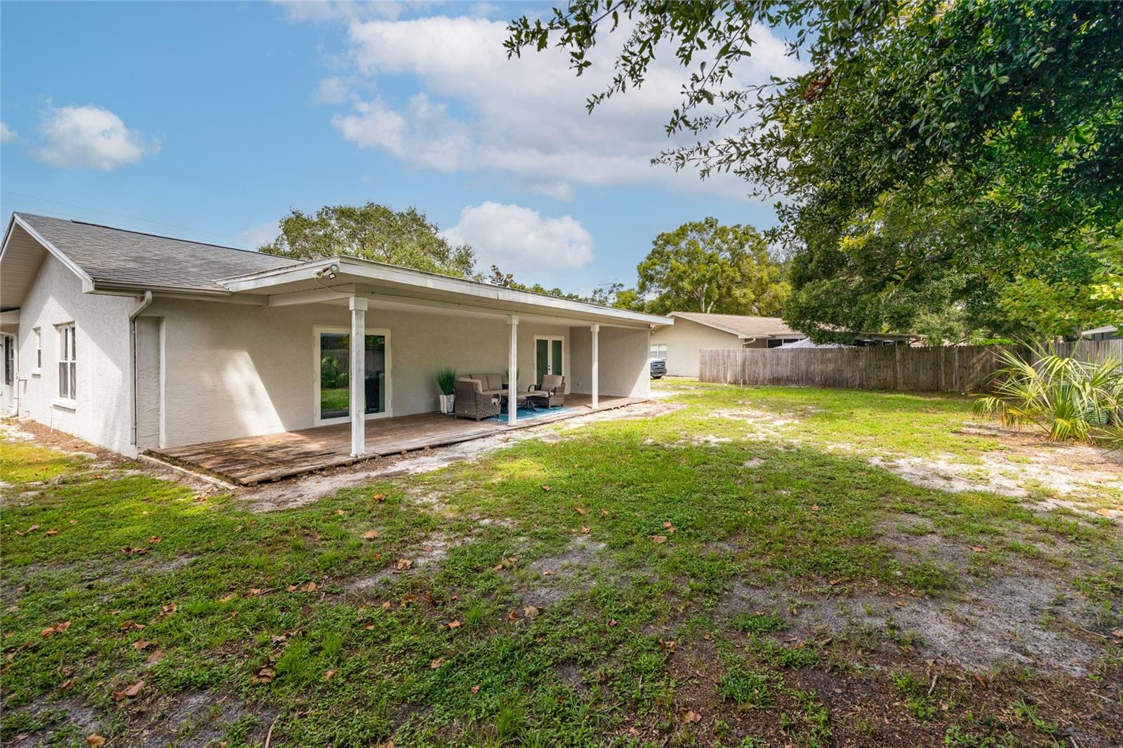 This home has a deck that spans much of the rear of the home and is covered.     There is also a more private patio off the Primary Bathroom.