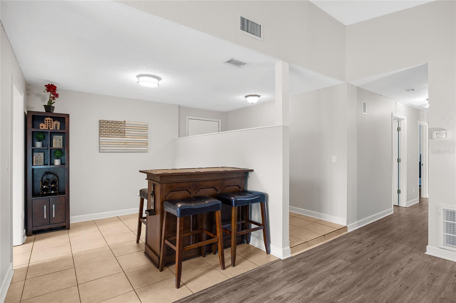 This bonus space is convenient to the kitchen and Living Areas and could be a home office or hobby space, play room?