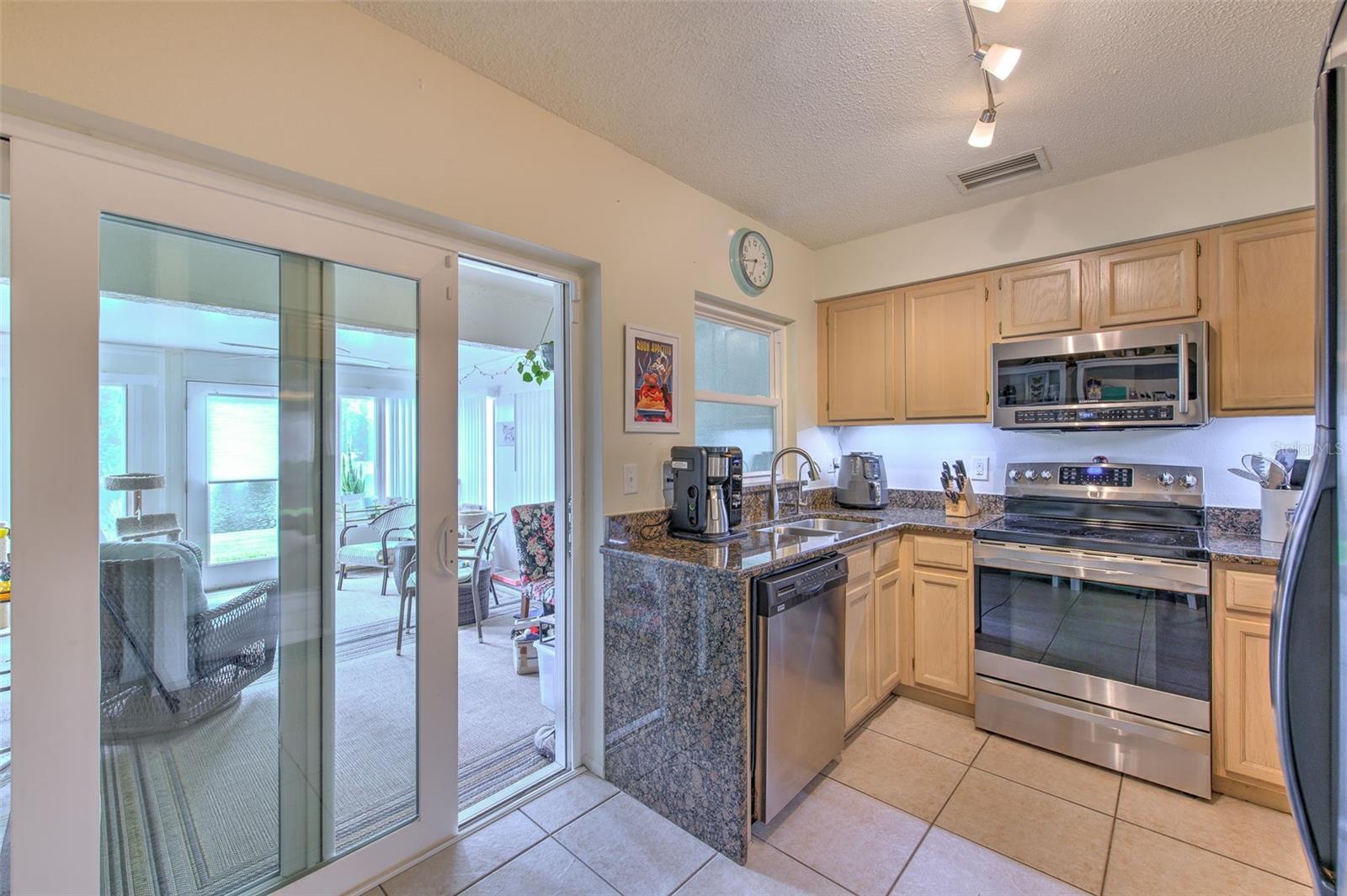 Kitchen with Stainless Steel Appliances and granite countertops