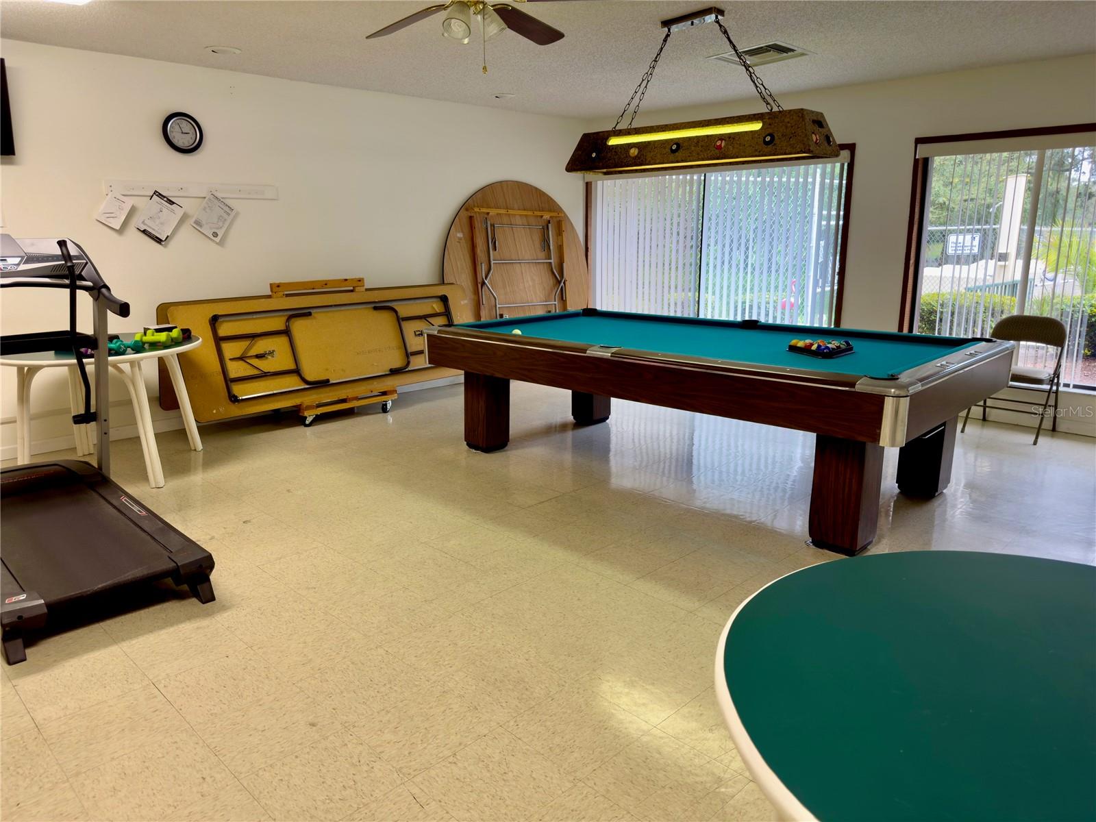 exercise and pool table room