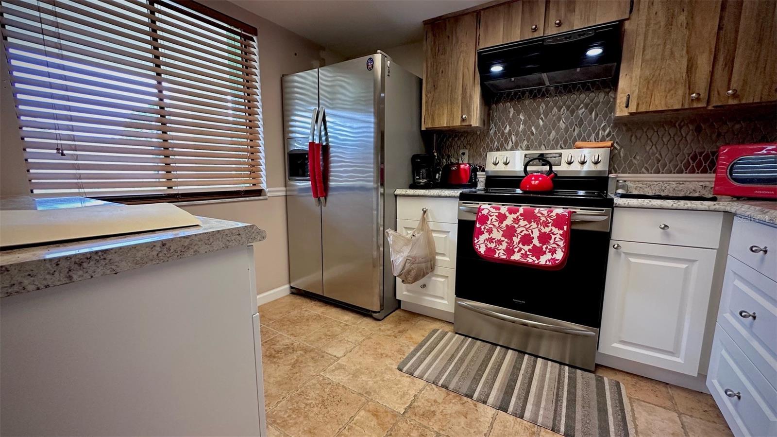 Stainless steel appliances in kitchen