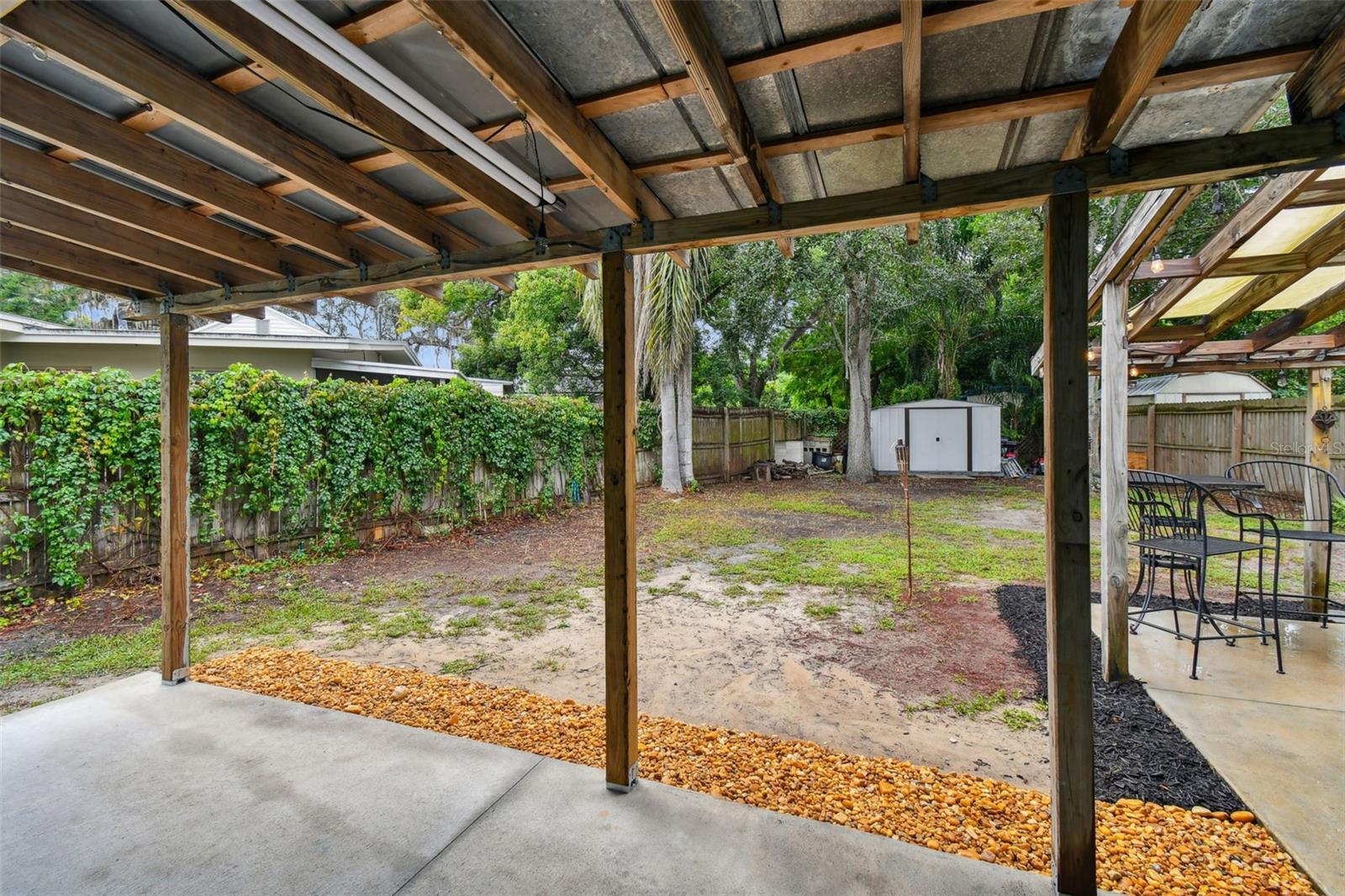 looking at backyard from side patio