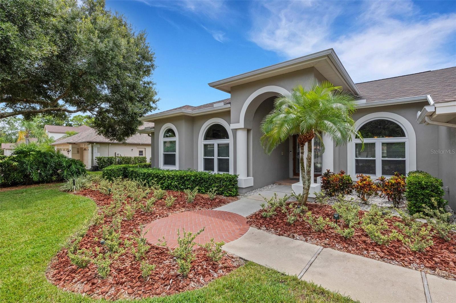 Stunning Lansbrook, Palm Harbor home with an office and mother-in-law suite!