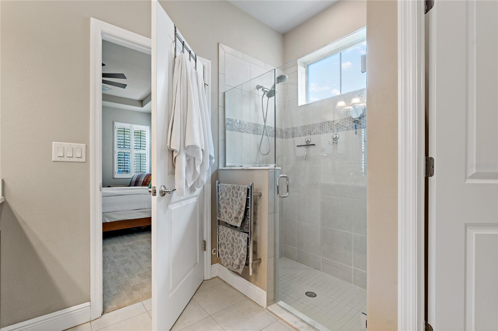 WALK IN SHOWER IN PRIMARY BATHROOM ~ WITH TOWEL WARMING RACK