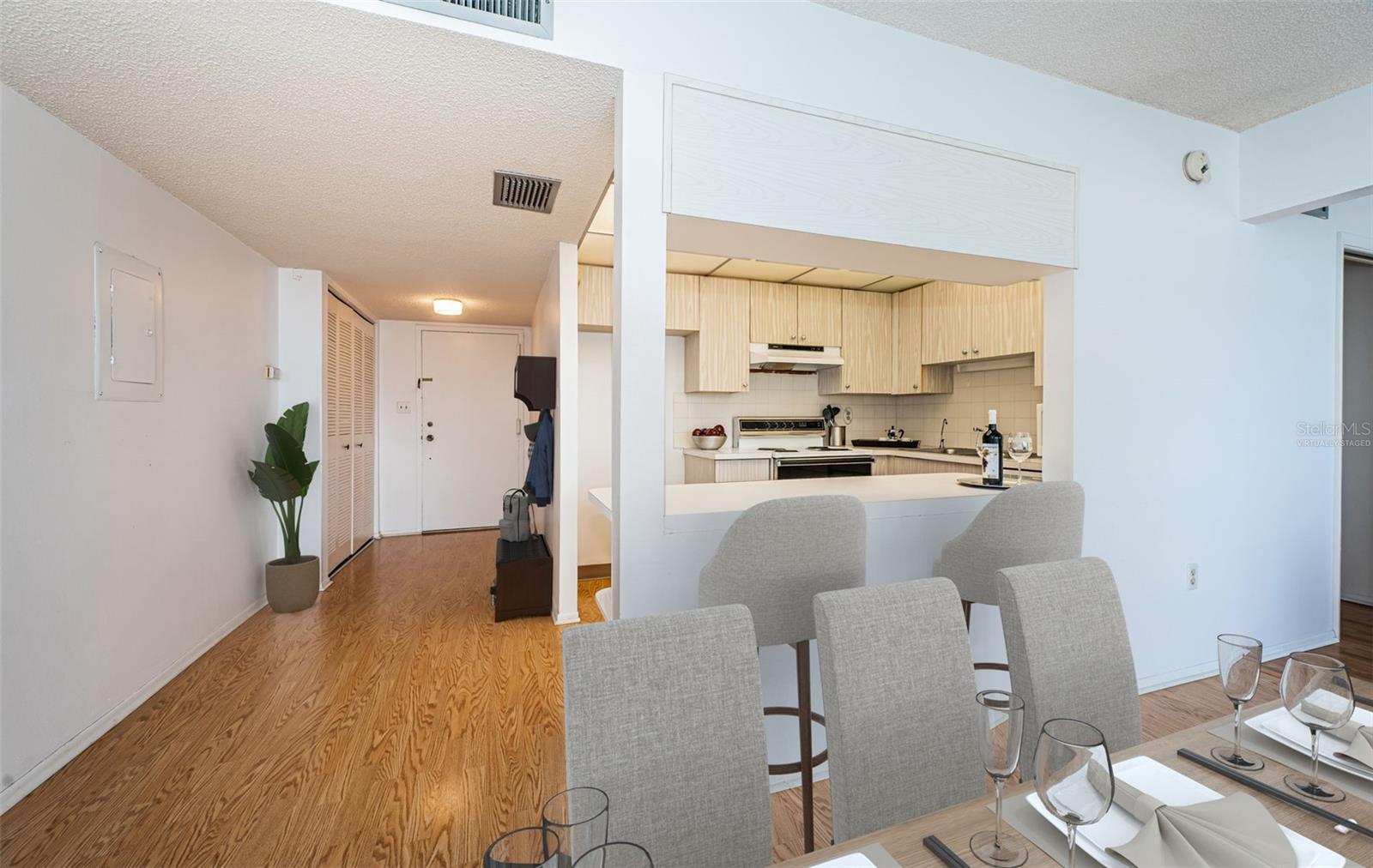 Dining Room/Foyer/Kitchen- Virtually Staged