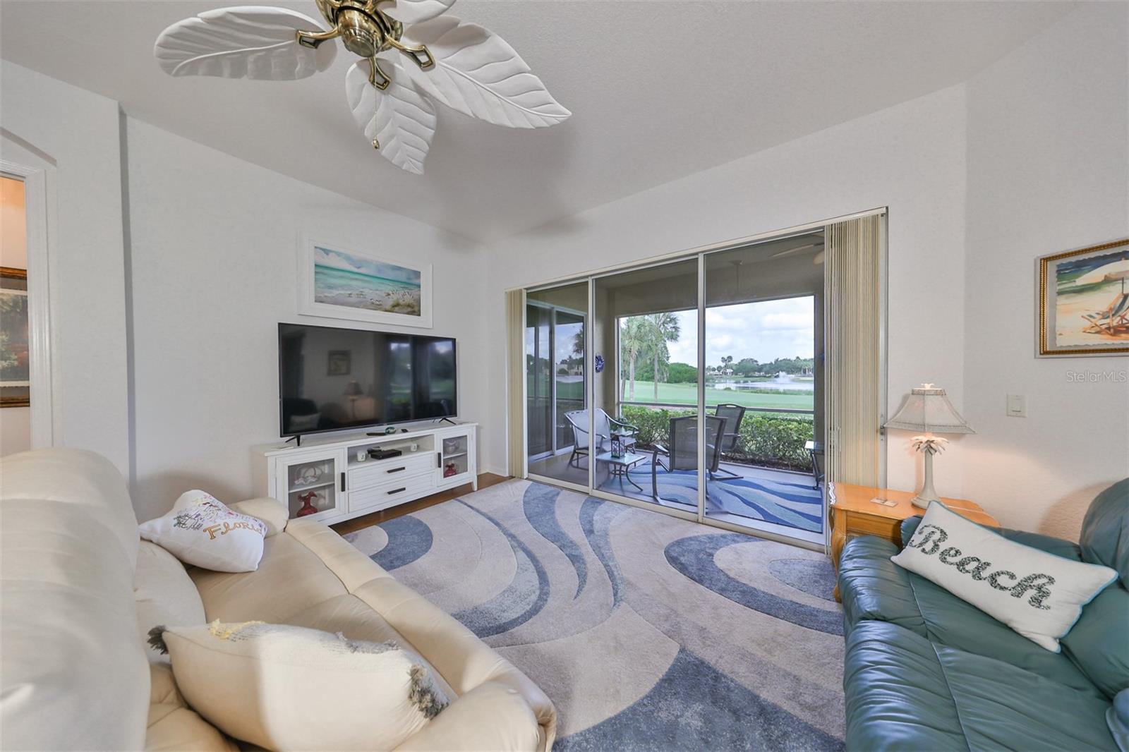 The large triple sliding glass doors and windows allow Florida sunshine to fill the home. Relax and enjoy the animation from the Golf Course at Renaissance right from the comfort of your own couch.