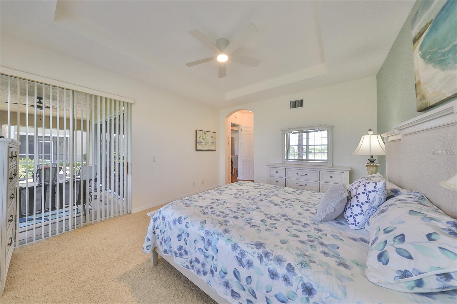 A perfect view overlooking the screened in Lanai. Notice this room is large enough to fit even a king size bed with an extra seating space to spare.