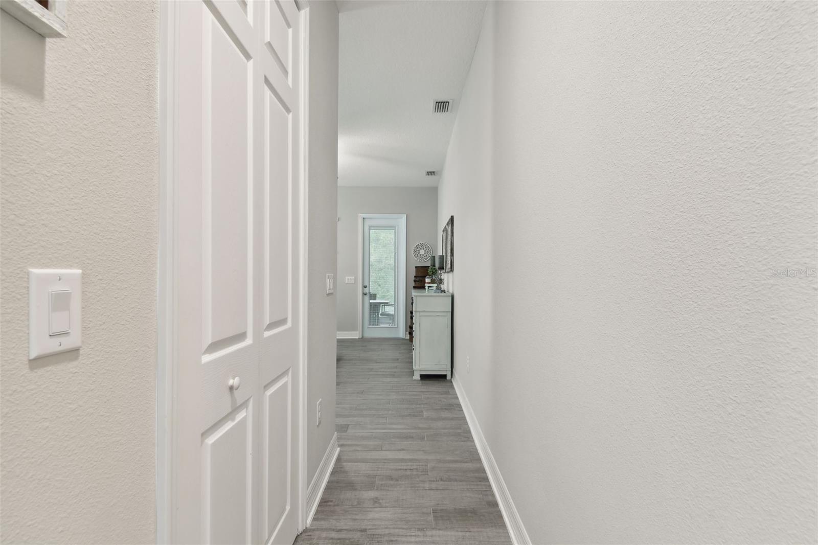 HALLWAY TO PRIMARY BEDROOM