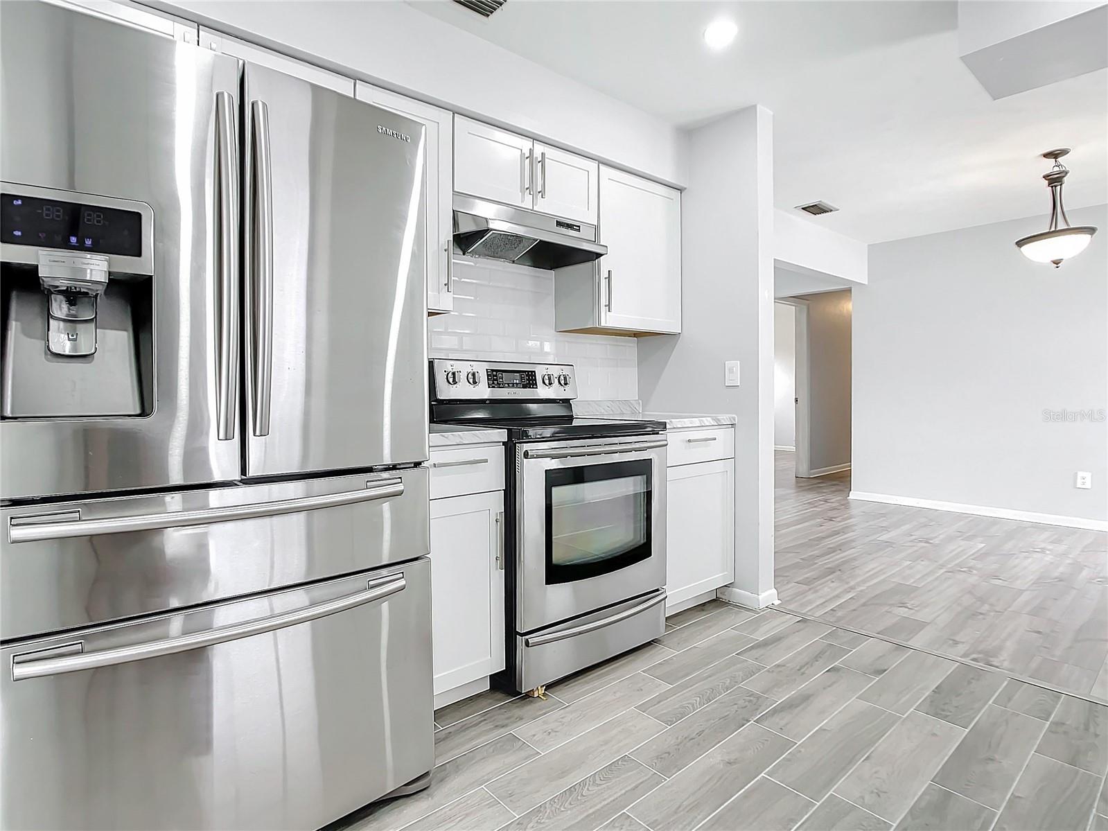 Back house kitchen - refrig, stove w/hood new appliances