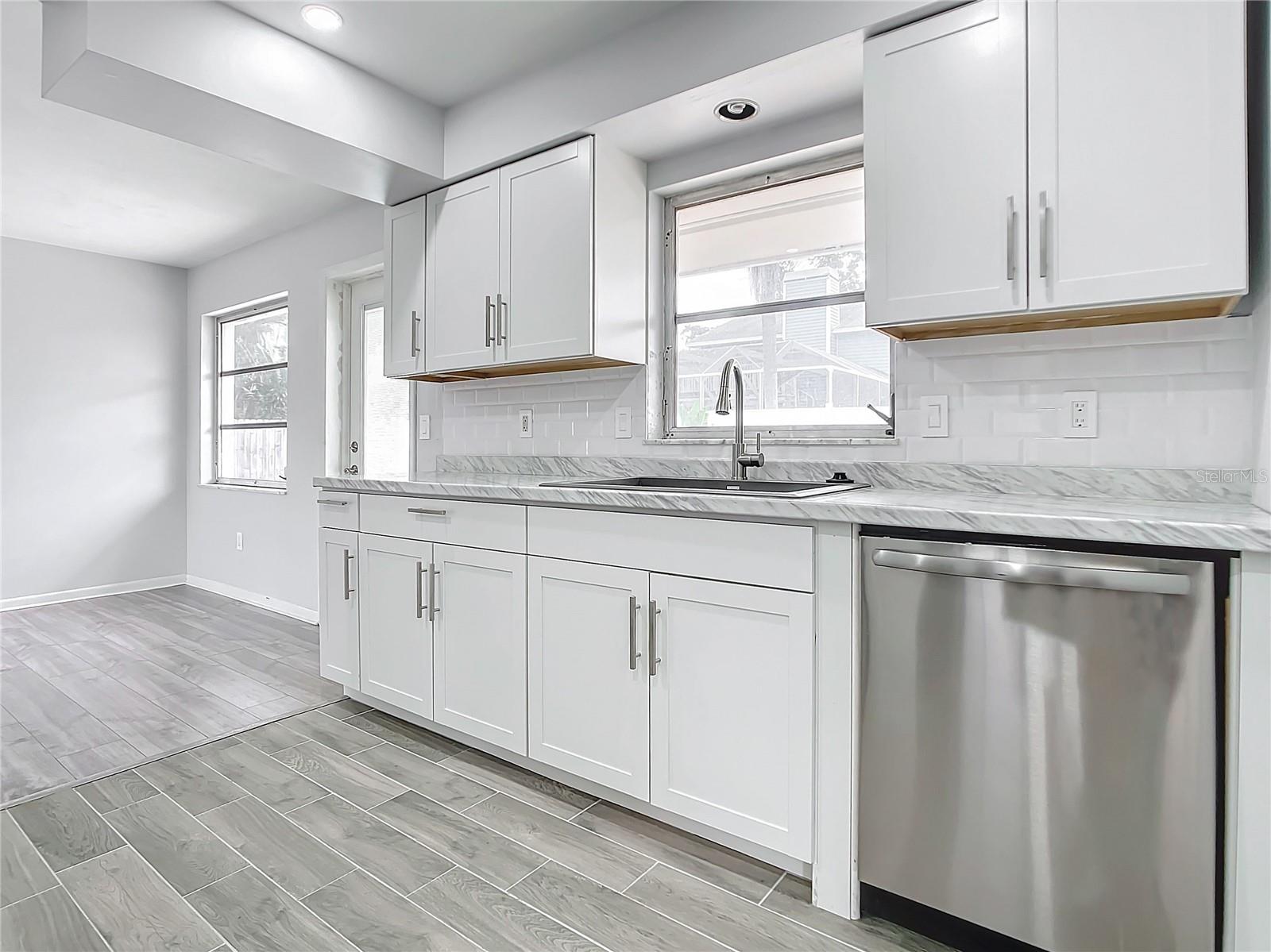 Back house kitchen - dishwasher, garbage disposal new appliances