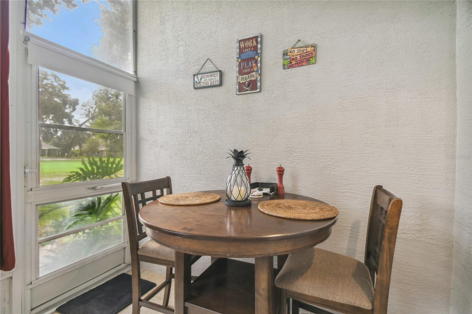 BREAKFAST NOOK IN ENCLOSED SUNROOM