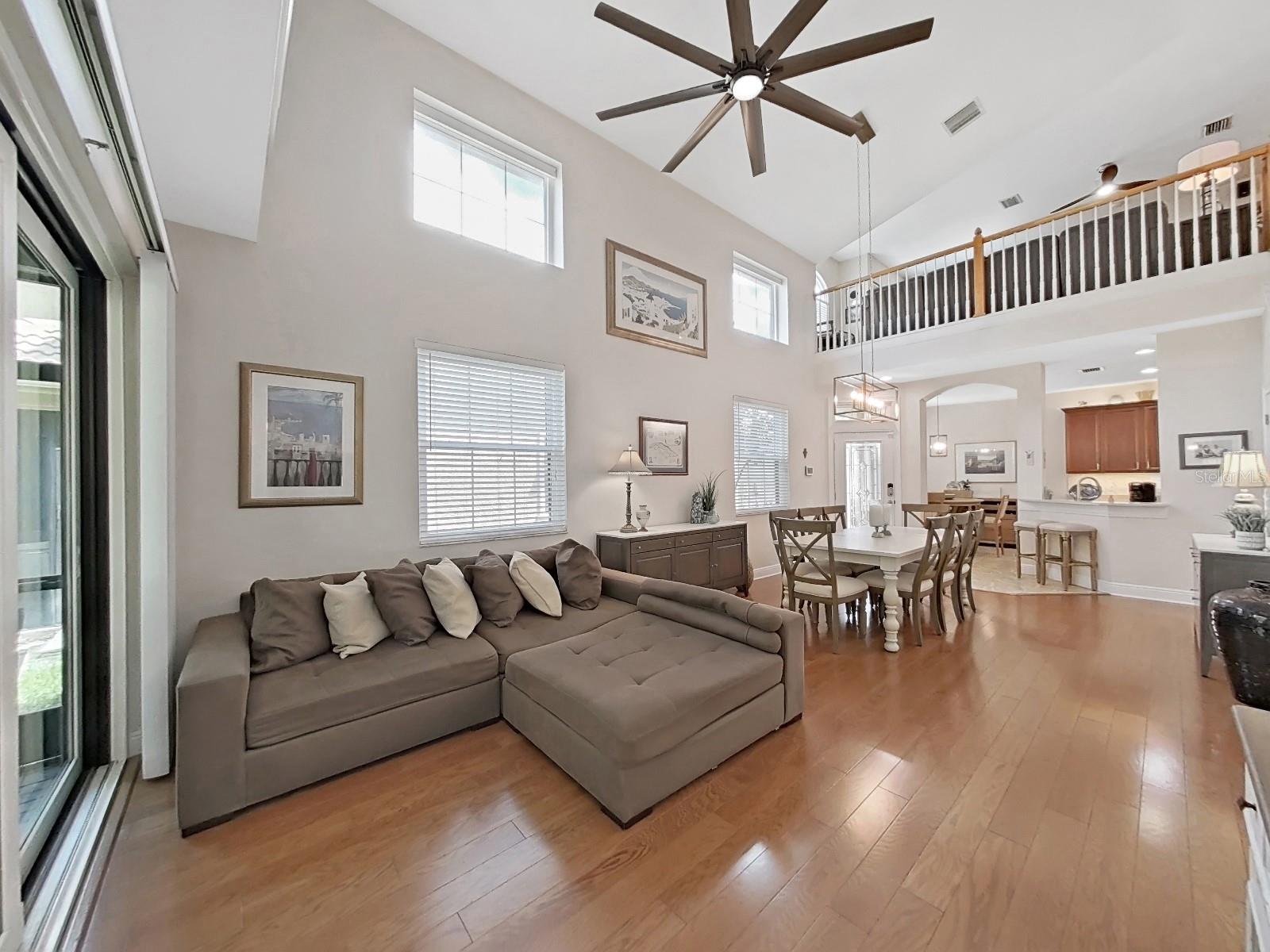 Loft upstairs looks over soaring great room.  Stunning.  lots of room for art!