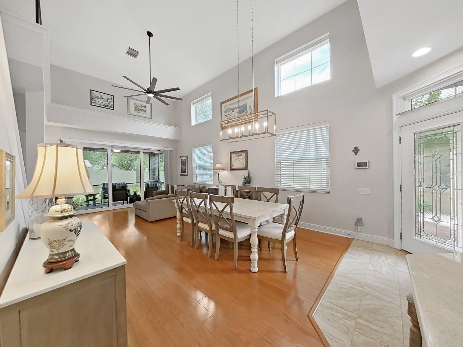 New lighting fixture in dining room.  Windows offer tons of natural light