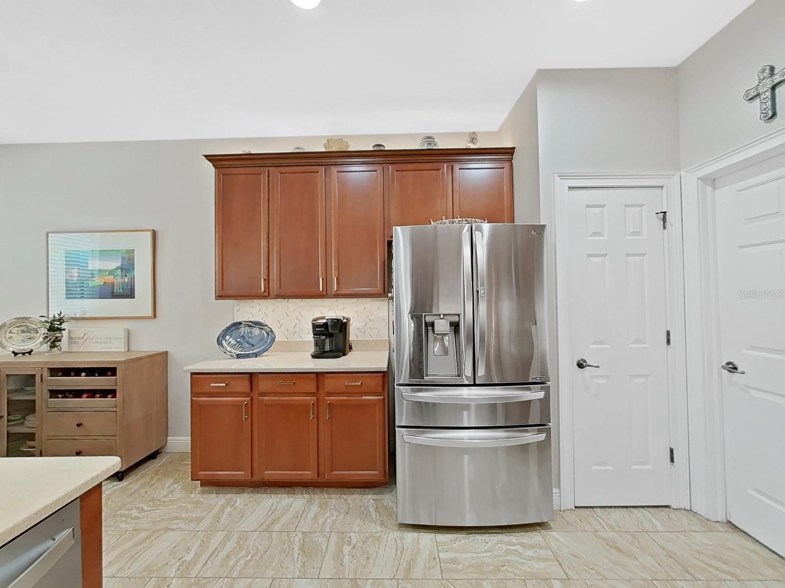 Under and over cabinet lighting for special effects. Pantry door and laundry door on right