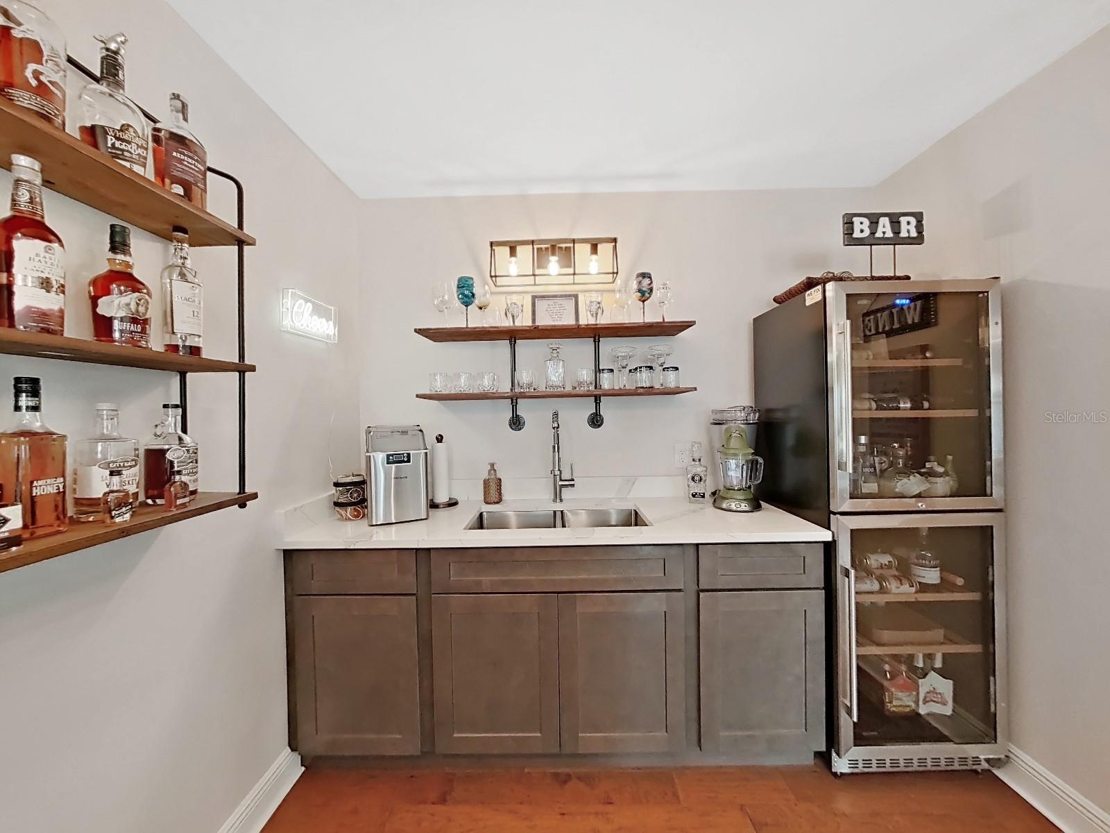 Sellers added cabinet and sink for perfect area for mixing margaritas with tequila or not!