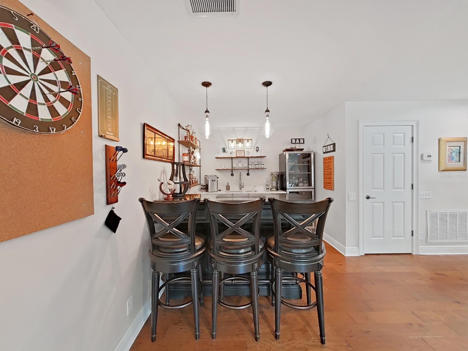 Bar and stools included.   You have the perfect entertaining space.