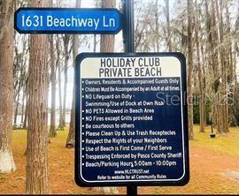 Visit 1631 Beachway Lane to see the private beach, dock and boat ramp.