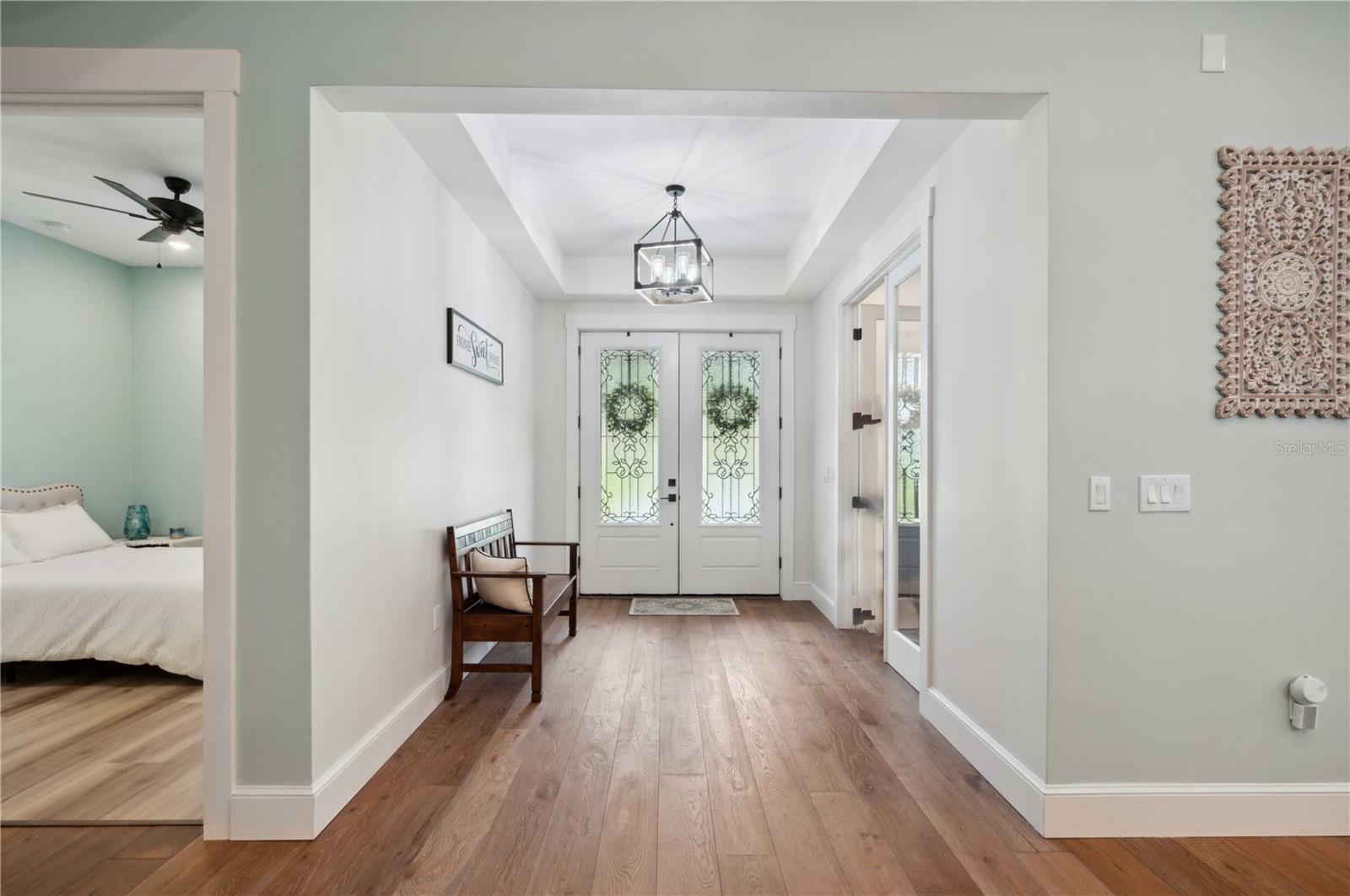 Foyer with coffered ceiling