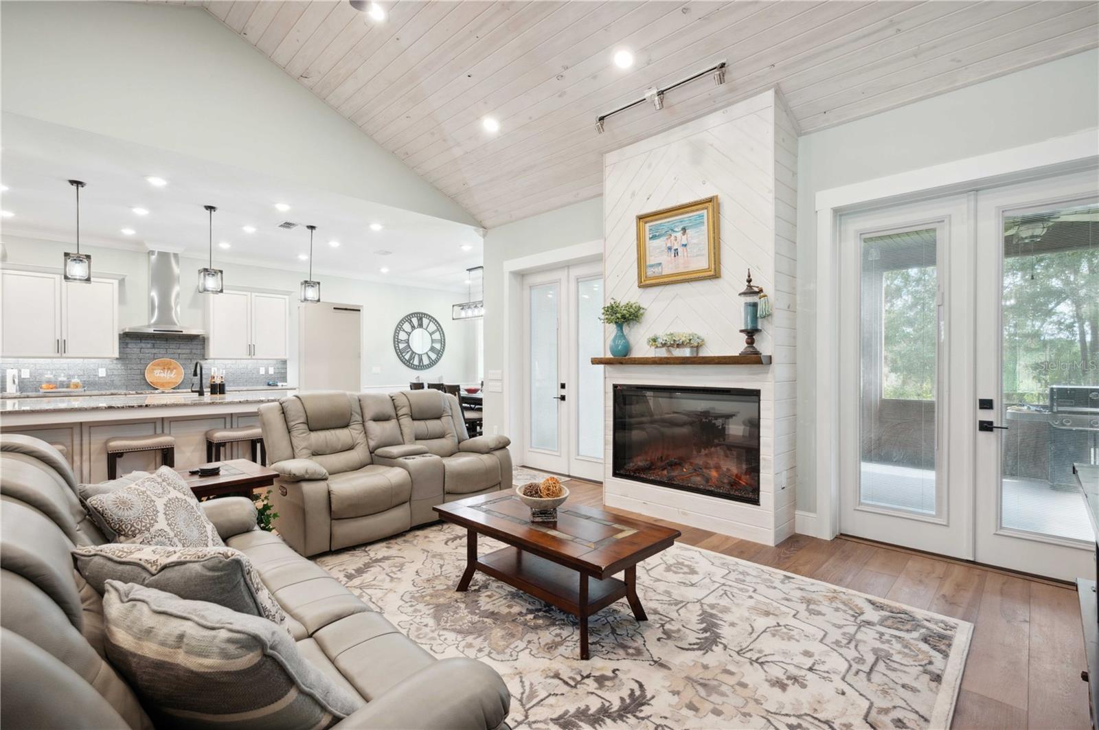 Living Room with Knotty Pine Vaulted Ceiling